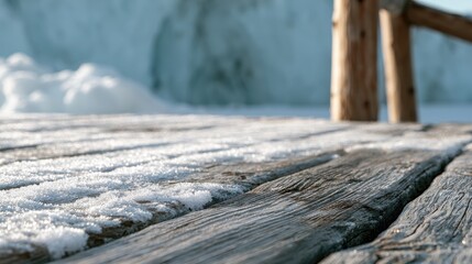 Fototapeta premium Frosty wooden planks with icy backdrop and weathered posts