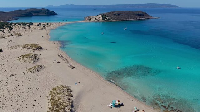 Discover the stunning beauty of Simos Beach in Elafonisos, Greece. Experience crystal-clear waters and soft sandy shores in this idyllic summer paradise.