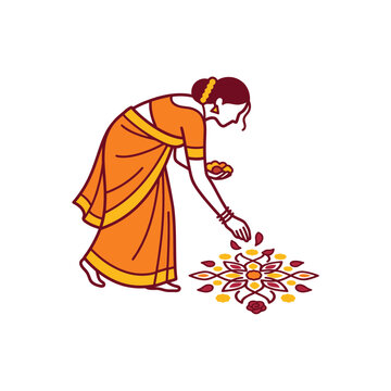 Woman in sari bending over rangoli art.
