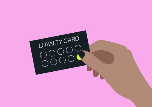 A hand holds a loyalty program card proudly showcasing stamps from a Cafe, Each stamp represents a memorable visit filled with coffee and warmth.