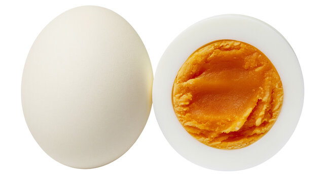 Whole hard-boiled egg next to a halved egg showing yolk and white
