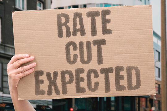 "Rate Cut Expected" Markets anticipate Bank will lower borrowing costs. INTEREST. RATE. CUT. BANK. FORECAST.