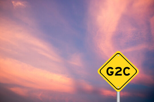 Yellow transportation sign with word G2C (Abbreviation of Government to Citizen) on violet color sky background