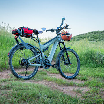 touring e-bike on a prairie biking trail in Colorado foothills