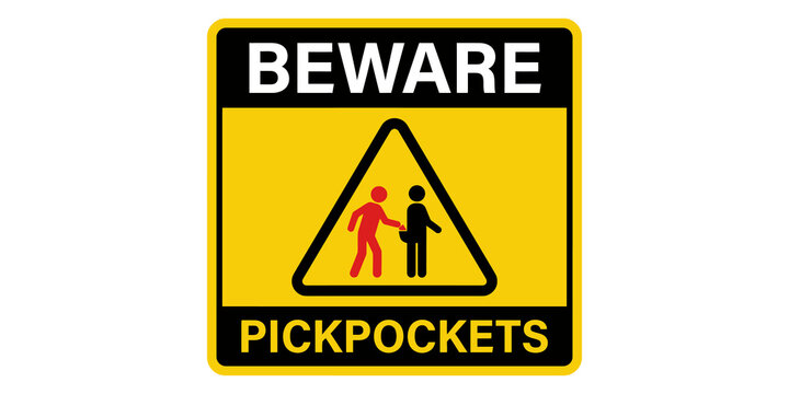 Beware pickpockets sign with warning triangle and figures, for safety and security awareness.