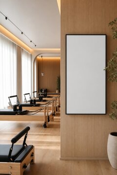Blank Vertical Frame Mockup in a Modern Pilates Reformer Studio
