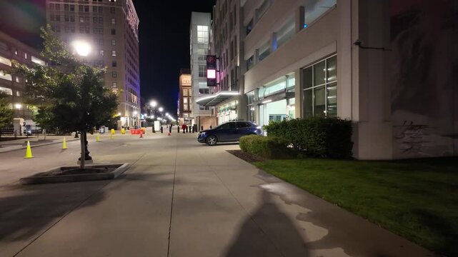 Walking on a Sidewalk in Downtown Detroit During the Night