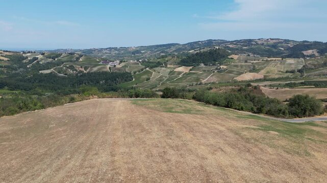 Europe, Italy, Lombardy, Pavia, Mont&ugrave; Berchielli &ndash; drone view of the Oltrep&ograve; Pavese hills; drought and water shortages lead to an early grape harvest for wine production. Global warming and climate ch