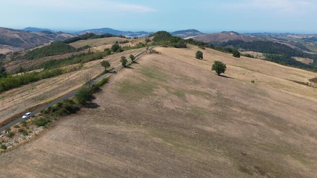 Europe, Italy, Lombardy, Pavia, Mont&ugrave; Berchielli &ndash; drone view of the Oltrep&ograve; Pavese hills; drought and water shortages lead to an early grape harvest for wine production. Global warming and climate ch