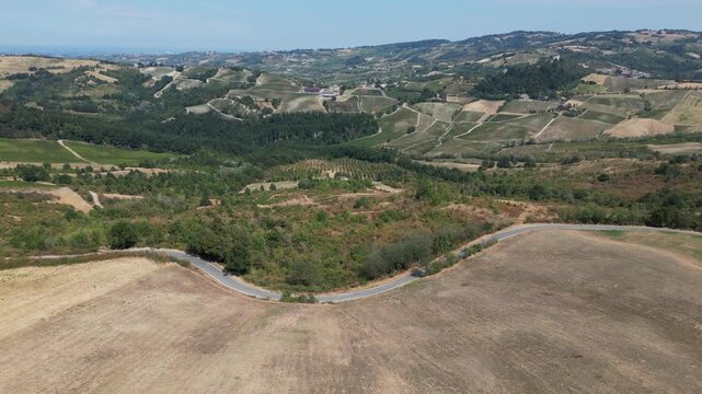 Europe, Italy, Lombardy, Pavia, Mont&ugrave; Berchielli &ndash; drone view of the Oltrep&ograve; Pavese hills; drought and water shortages lead to an early grape harvest for wine production. Global warming and climate ch
