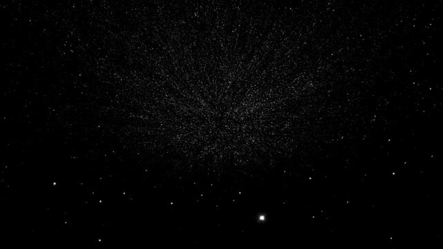 White particles and scattered points of light suspended in a dense cloud against black background