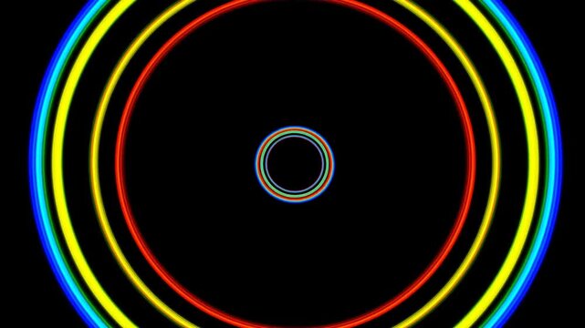 Concentric neon rings displayed as a colorful abstract geometric pattern on black background