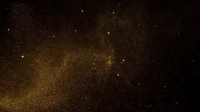 Golden dust particles suspended against a dark background with scattered glowing points of light