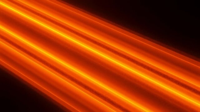 Abstract Orange Glowing Light Streaks Across Dark Background