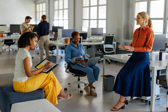 Business professionals collaborating in a brainstorming