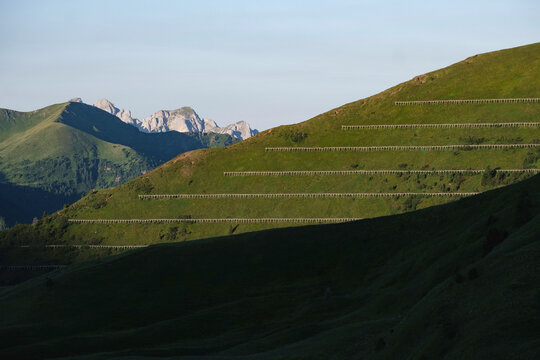 Avalanche protection fences on a steep alpine slope in the Italian 