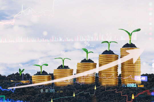 Growing investment concept with stacks of gold coins and green sprouts representing financial growth, wealth building, savings, investment returns and economic development.