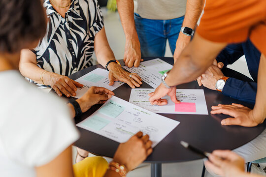 Team work planning business strategy on a table