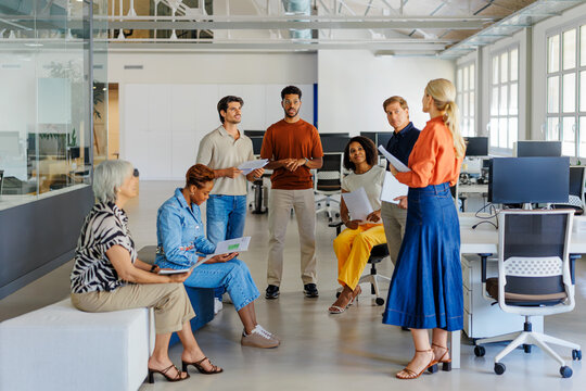 Business team collaborating in modern office meeting