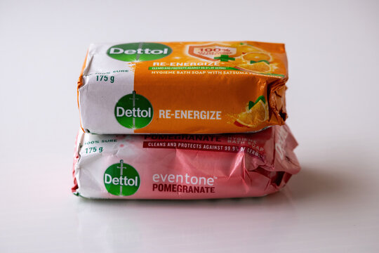 Kishoreganj, Bangladesh - 07 August, 2026 - Stacked Dettol Re-Energize and Eventone Pomegranate soap bars on white background. Popular antibacterial personal care item.