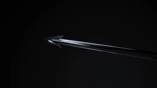 Metallic arrow with reflective highlight extending across black void