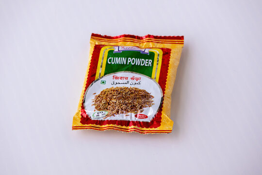 Kishoreganj, Bangladesh - 12 August, 2026 - Sealed packet of Kishwan Cumin Powder or jeera powder on white background. Popular Bangladeshi culinary spice package.