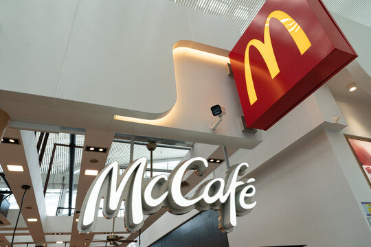 McCafe and golden arches signs at McDonald's restaurant