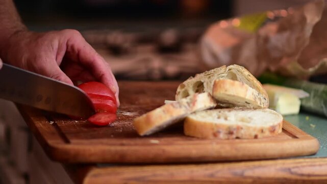 Sandwich making vegetarian food slicing, authentic man prepping morning sandwich, healthy eating, bokeh food background b roll video