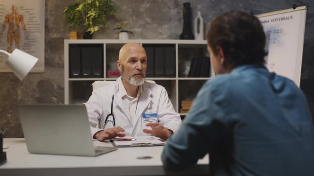 Doctor informs patient of good prognosis and successful recovery at check-up