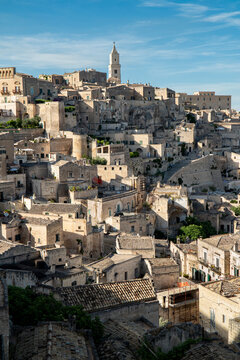 Matera, Basilicata, Italy :  view of the Civita neighborhood, home to the Cathedral of Matera, the rocky promontory that divides the two historic districts of the Sassi