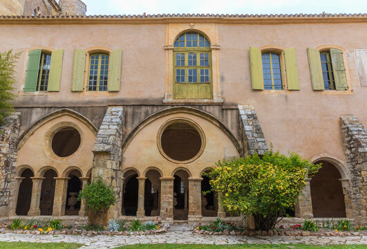 Series of photographs of Valmagne Abbey, a historic Cistercian monastery founded in the 12th century and located in the Occitanie region of France