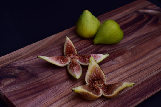 Fresh ripe figs whole and sliced for serving