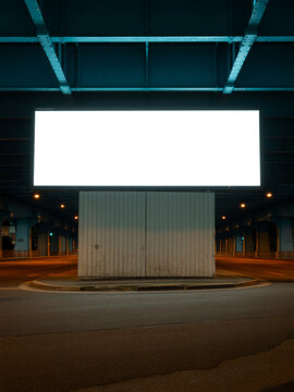 Blank billboard mockup under steel girder bridge