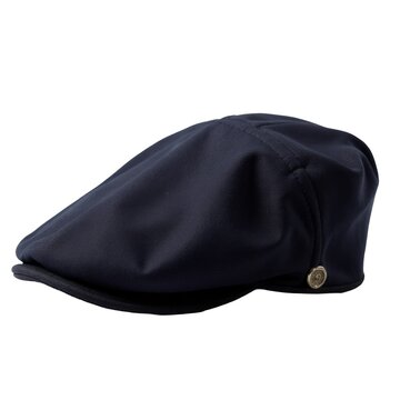 A man wearing a flat cap with a button on the front, suitable for everyday use or as part of a uniform