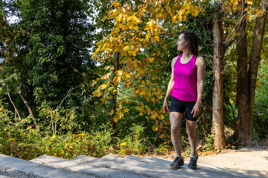 Active Woman Hiking Outdoor Stairs in Autumn at Little Mountain Stairs, Chilliwack, BC Canada