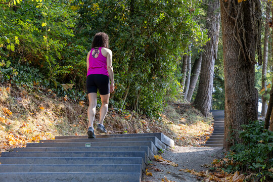 Fit Woman Walking Up Stairs At Little Mountain Stairs In Chilliwack BC Canada Park Trail
