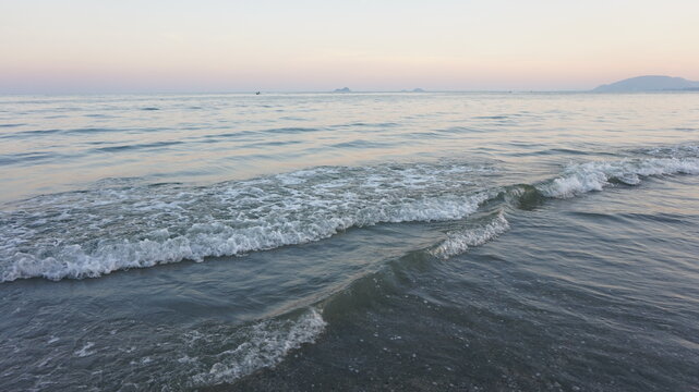 wave and sunset