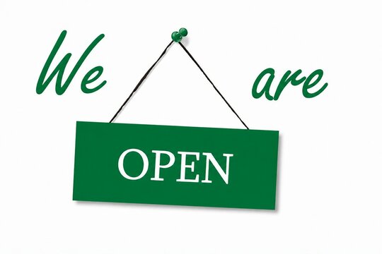 Green open business sign with hanging ribbon and cursive we are text