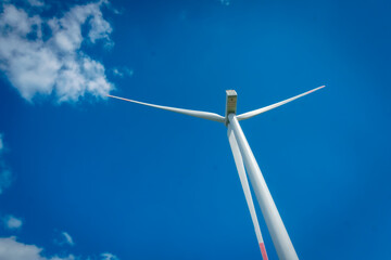 wind turbine against blue sky © Yaroslav