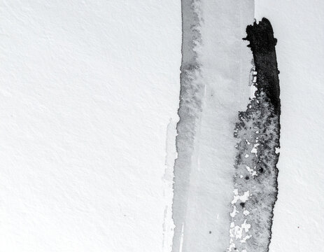 Two vertical ink bands on white paper, minimal monochrome abstract background with copy space