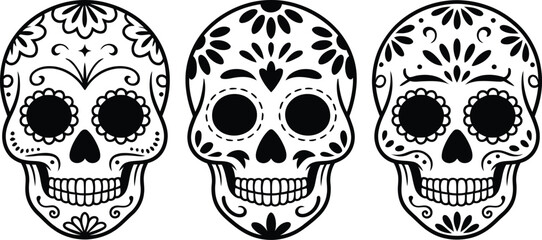 Fototapeta premium Three decorated skulls with floral patterns