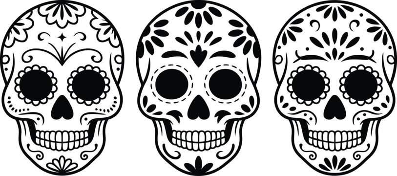 Three decorated skulls with floral patterns