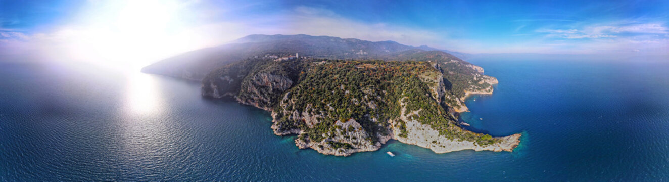 Aerial view of the village of Brsec perched on cliffs above the Adriatic Sea, with lush vegetation and rocky coastline in Brsec, Primorje-Gorski Kotar, Croatia.