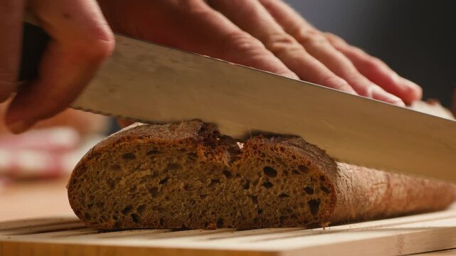 Bread multigrain loaf held in hands, whole wheat seeded crust with millet and seeds, close-up macro shot