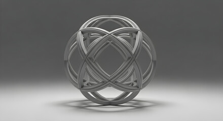 Obraz premium Abstract silver sphere featuring complex geometric interconnected structural rings in a minimalist studio setting