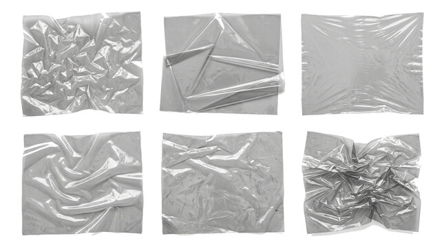 Crumpled transparent plastic wrap sheets with various crinkled textures and folded glossy edges arranged in a professional collection isolated for graphic design usage on transparent background.
