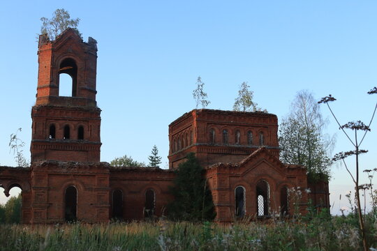 The old abandoned Orthodox Church of St. Michael the Archangel in the abandoned village of Mikhailovka in the north of the Kirov region on a summer day