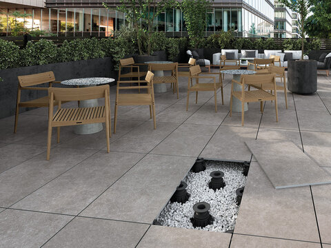 Adjustable pedestal system for raised flooring on modern outdoor terrace