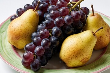 Naklejka premium Ripe pears and dark grapes are arranged on a decorative plate. Fresh healthy fruits offer a sweet natural snack perfect for any meal or dessert.