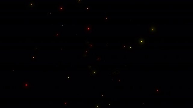 Glowing red, yellow and orange glitter particles floating and twinkling across the frame, isolated footage with alpha channel for overlays and festive compositions